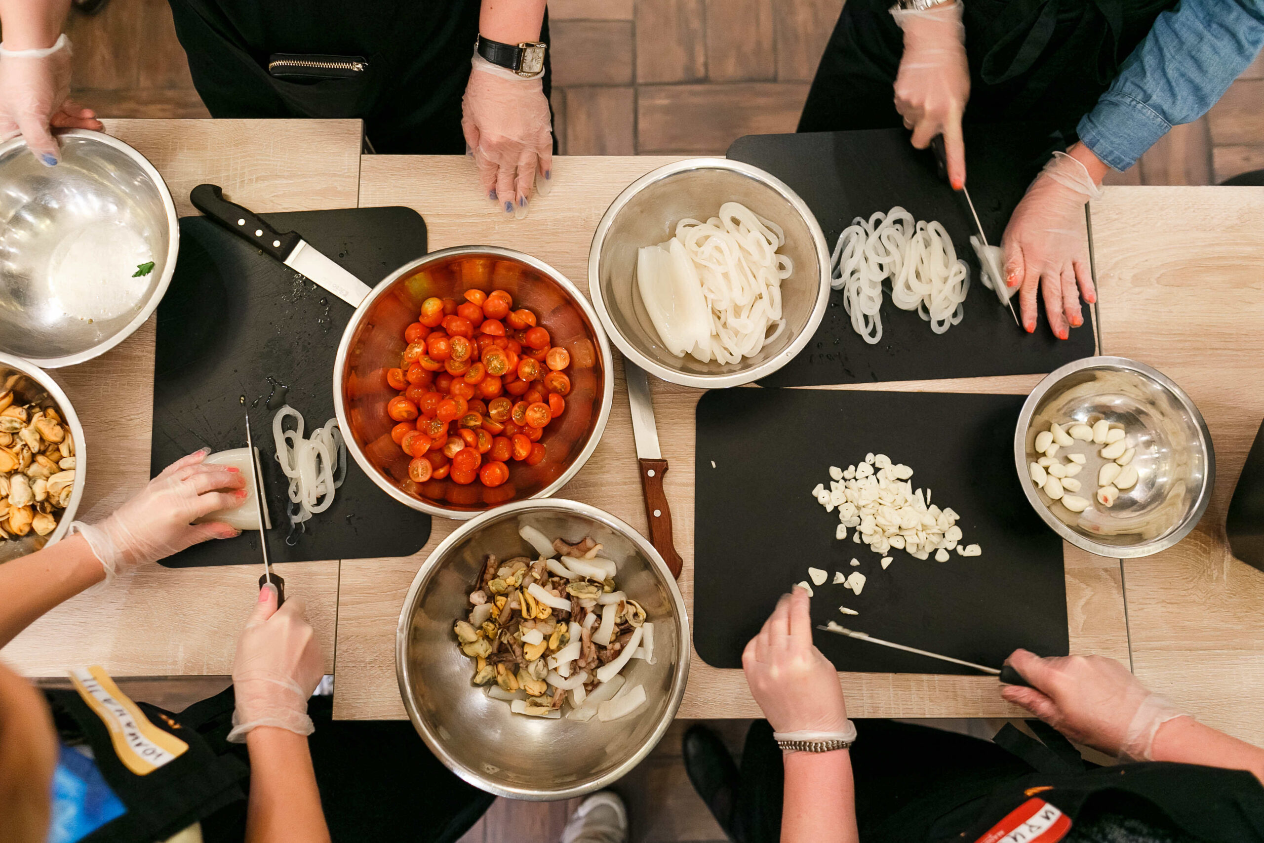 Overhead shot of people cooking a meal