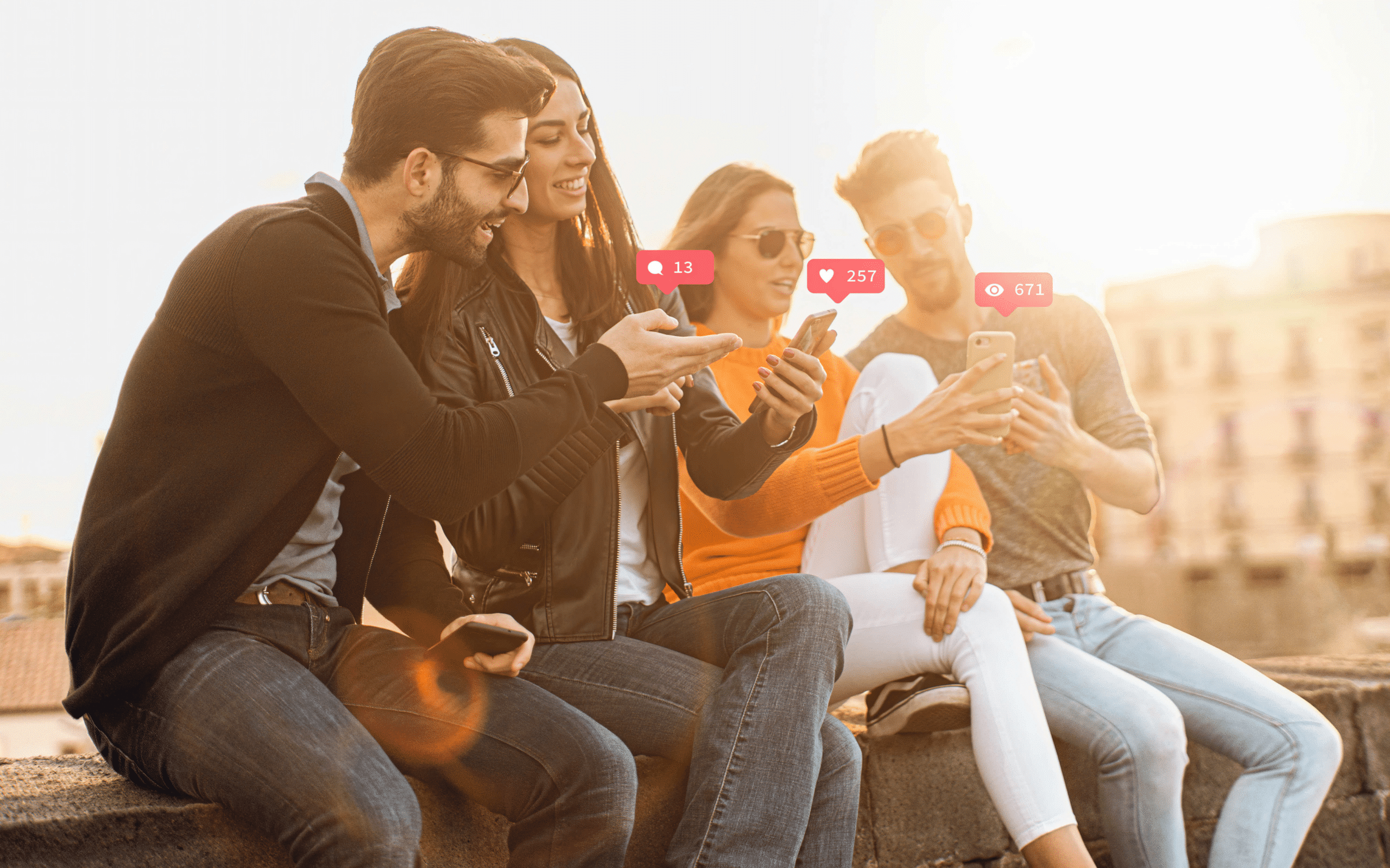 a group of friends looking at social media together on their phones