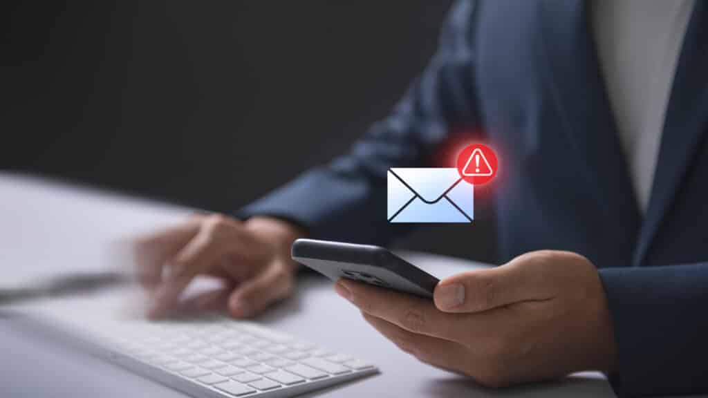 Email hacked warning alert notification with scam malware spreading virus on message alert virtual on smartphone